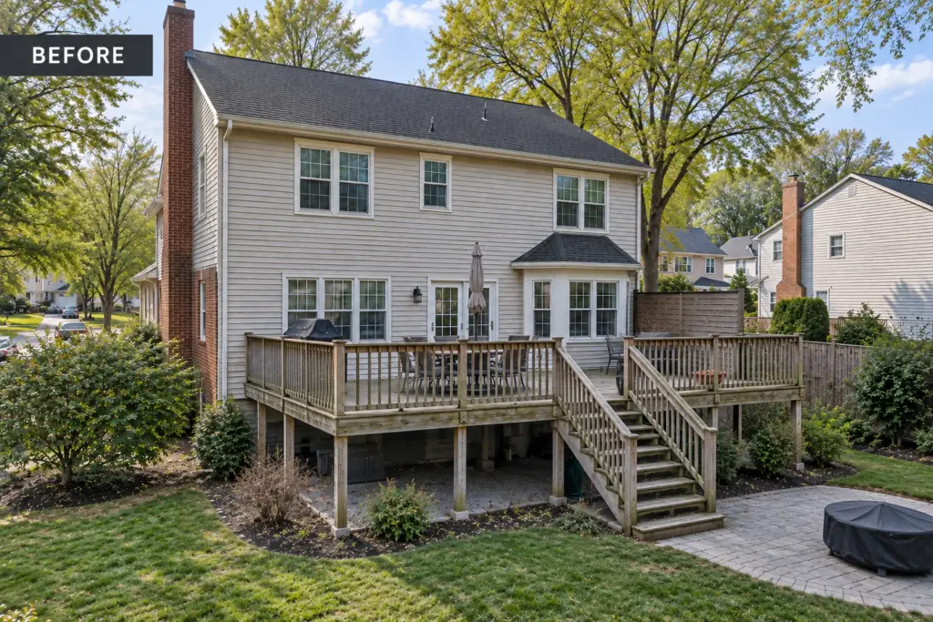 Before composite deck builder project in Calverton, MD showing a weathered wood deck and aging stairs
